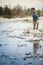 Man throwing stones in the river