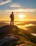 A man on the top of a hill feeling hope, strength, and motivation