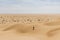 Man tourist desert rub al khali Oman running in sand 2