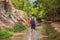 Man tourist on the Fairy stream among the red dunes, Muine, Vietnam. Vietnam opens borders after quarantine COVID 19