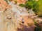 Man tourist on the Fairy stream among the red dunes, Muine, Vietnam. Vietnam opens borders after quarantine COVID 19