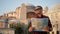 Man tourist looking at map against Ayasofya Mosque, travel concept