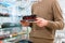 Man in toy store buying model railroad