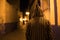 Man in Traditional moroccan djellaba walking on the street of Asilah Medina, on Atlantic Coast in Morocco