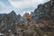 Man trail running alone hiking in mountains travel climbing adventure active extreme vacations