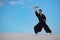 Man is training Japanese martial arts in desert