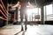 Man training with jumping rope on the boxing ring