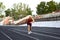 A man in training for running at the stadium, the athlete prepared for the start