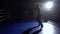 Man trains in the ring . Silhouette. Light from behind