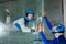 A man trains a woman as an astronaut. Classes on flying in a wind tunnel.