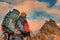 Man Traveler with big backpack mountaineering Travel Lifestyle concept lake and mountains on background, extreme vacations outdoor