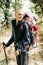 Man traveler carries child in backpack. Father took kid to the mountains