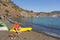 A man traveling by canoe along the coast