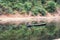 Man traveling in a canoe on the river