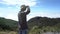 Man traveller at the top of mountain enjoy the view above the clouds.