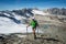 Man trekking in the Alps in a beautiful sunny day. Grand Paradiso National Park. Italy