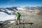 Man trekking in the Alps in a beautiful sunny day. Grand Paradiso National Park. Italy