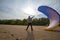 Man tries to catch the wind with a paraglider