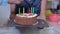 Man try lights the candles on birthday cake