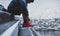 A man tying running shoes, preparing for running in winter. healthy lifestyle