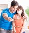 Man tying up his wife to watch sports football