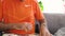 Man unboxing parcel containing Nike clothes time lapse fast motion