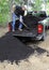 Man unloading compost