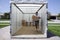 Man unloading portable storage unit