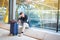 Man upset, sad and angry at the airport his flight is delayed