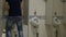 Man with urinary incontinence runs to the urinal in public restroom