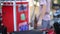 Man use gas pump nozzle filling gasoline fuel to tank of motorcycle in oil station. Thailand. 1920x1080