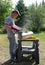 Man Using Belt Sander