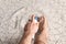 Man using foot deodorant at home, closeup