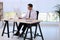 Man using footrest while working on computer