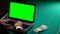 Man using laptop on poker table, earning money in online betting, gambling