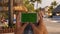 Man using mobile phone near swimming pool.