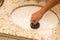 Man Using Plunger to unstop his sink