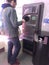 Man using reverse vending machine