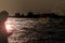 Man using smartphone at the port of ferry boats - backlight