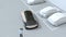 Man using smartphone to remote control car parking. Self parking system concept