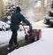 Man Using Snow Blower