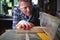 A man using a table saw