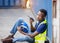 Man Using Walkie Talkie At Container Terminal, Industrial worker is controlling container loading