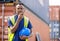 Man Using Walkie Talkie At Container Terminal, Industrial worker is controlling container loading