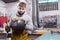 Man using welder for construction work at the workshop