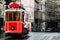 Man in a vintage tram on the Taksim Istiklal street in Istanbul. Man on public transport. Old Turkish tram on Istiklal street,