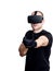 Man with virtual reality headset playing video games
