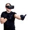 Man with virtual reality headset playing video games