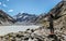 Man visits Mount cook, New Zealand. Young tourist photographing