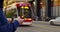 Man waiting tram, engrossed smartphone. Scene depicts urban life, with focus smartphone use. Man tram stop scrolling